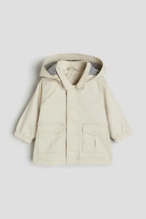 Hooded cotton parka - Long sleeve - Regular length - Light beige - Kids | H&M GB