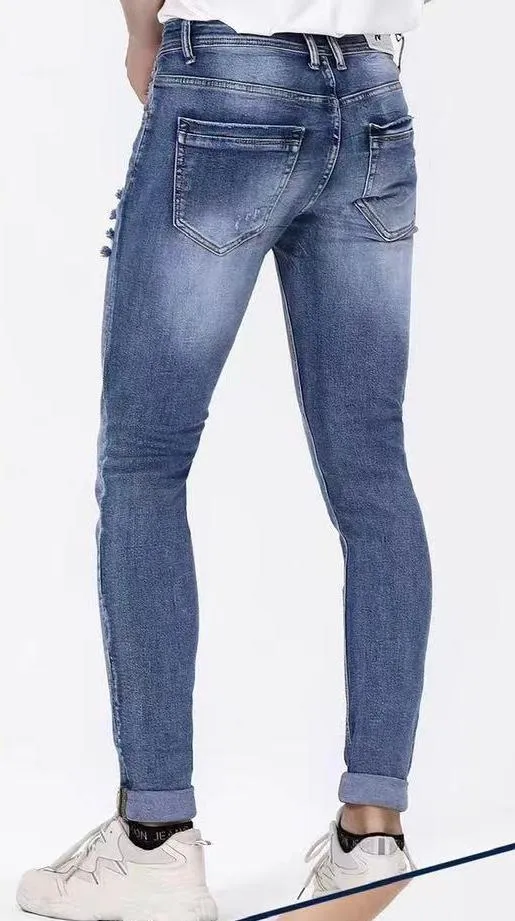 JEANS UOMO SFUMATI CON PICCOLI STRAPPI